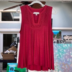 Red sleeveless top